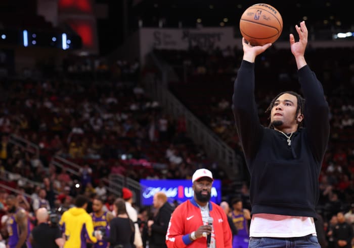 Texans quarterback CJ Stroud throws out the first free throw before the Houston Rockets play the Los Angeles Lakers at Toyota Center.